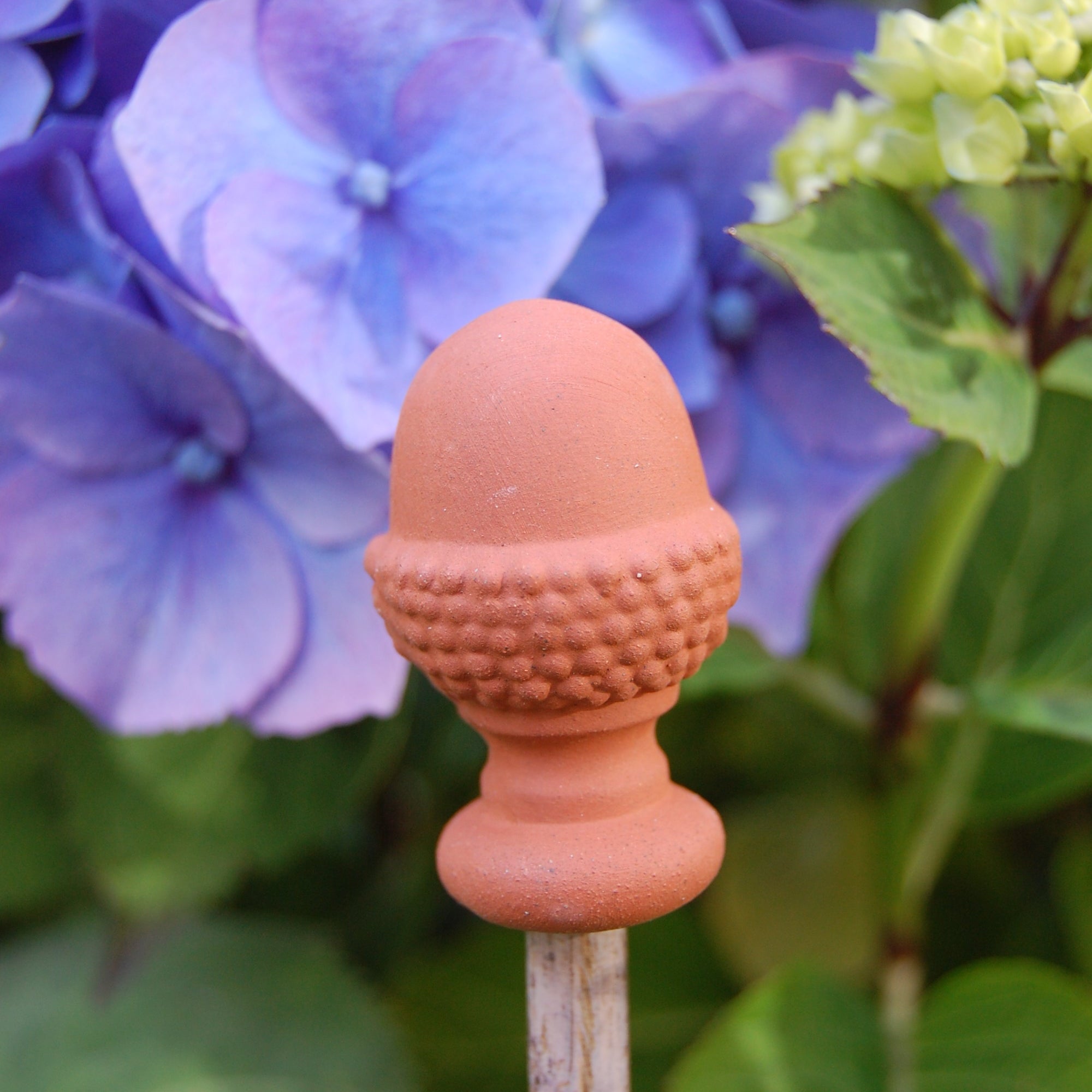 Terracotta cane toppers