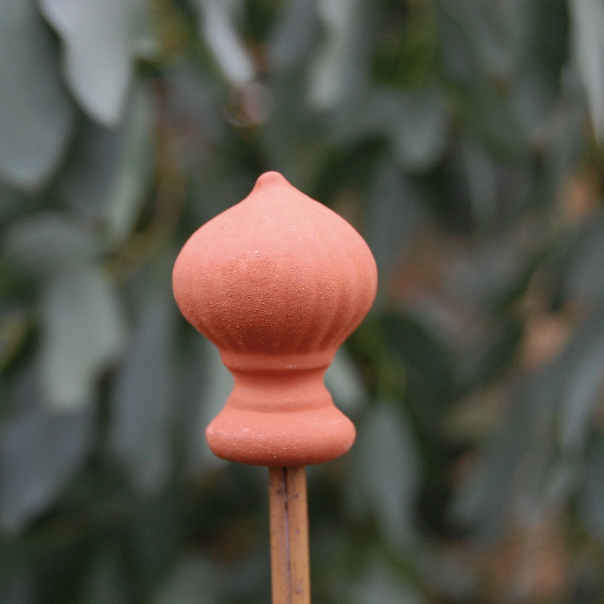 Terracotta cane toppers