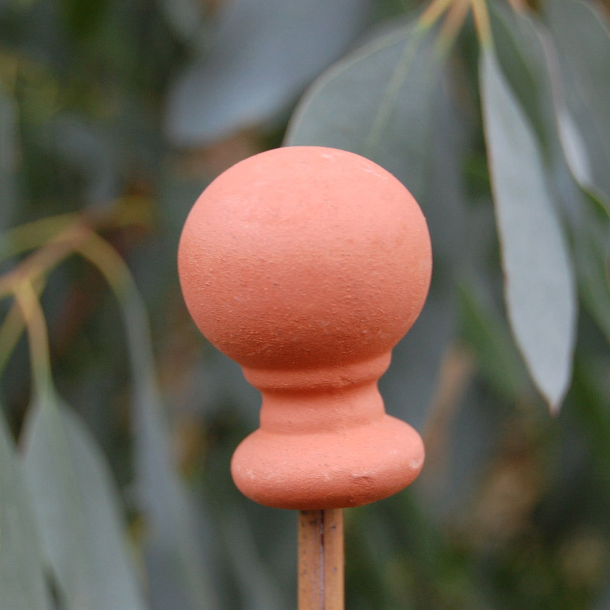 Terracotta cane toppers